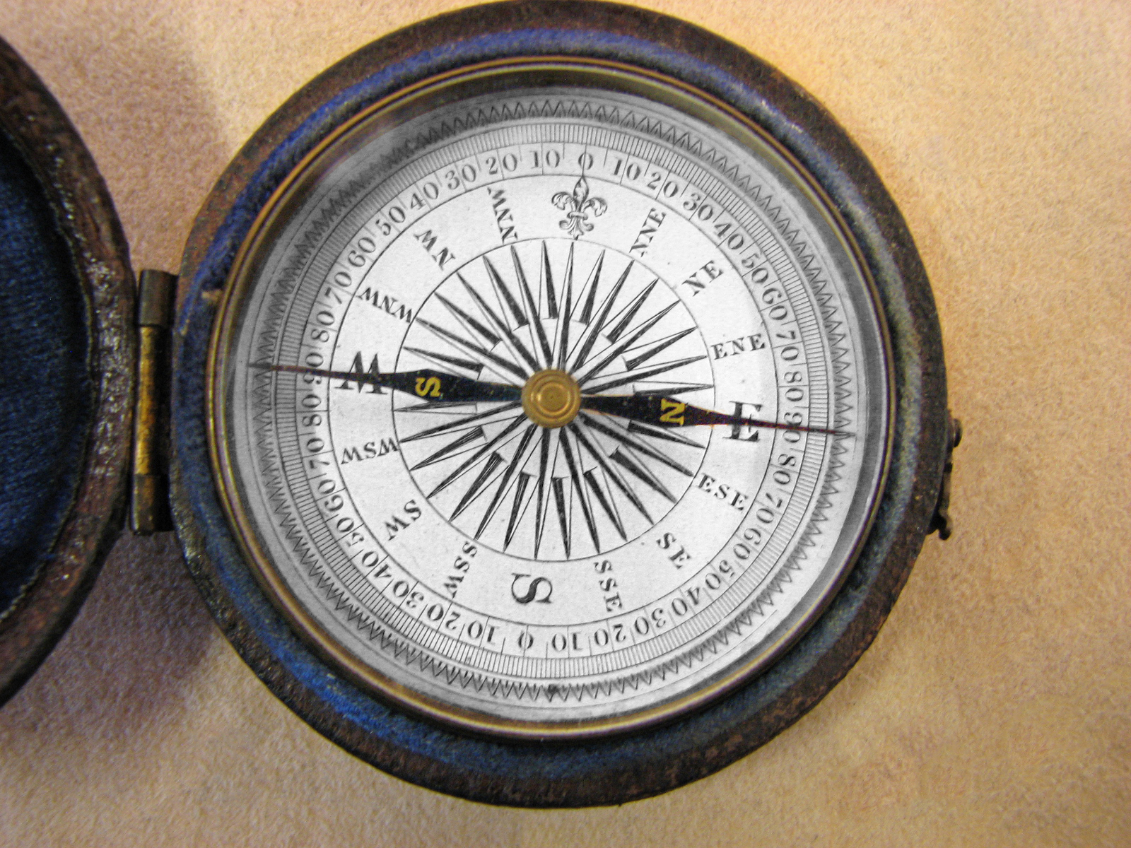 Early Victorian pocket compass in leather covered outer case circa 1860